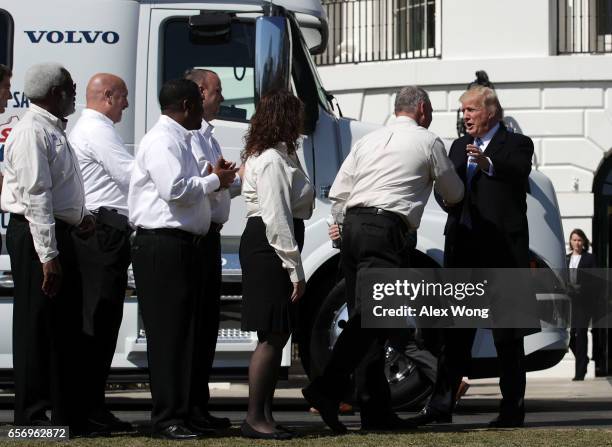 President Donald Trump greets truck drivers at the South Portico as he welcomes members of the American Trucking Associations to the White House...
