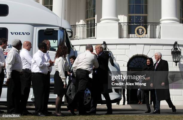 President Donald Trump greets truck drivers as Vice President Mike Pence and Administrator of the Centers for Medicare and Medicaid Services Seema...