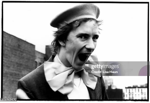 Lead singer of PIL John Lydon aka Johnny Rotten poses for a portrait for the program book for their upcoming tour of Japan on top of his residence on...