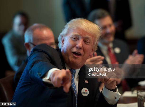 President Donald Trump holds a listening session on health care with truckers and CEOs from the American Trucking Associations in the Cabinet Room at...