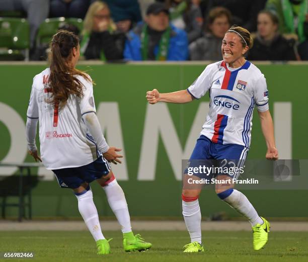 Camille Abily of Lyon celebrates scoring her goal during the UEFA Women's Champions League Quater Final first leg match between VfL Wolfsburg and...
