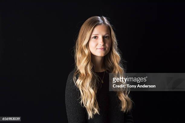 portrait of a young woman - wavy hair stockfoto's en -beelden