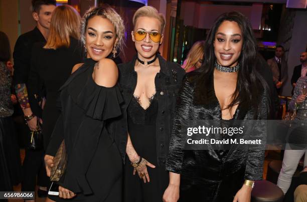 Karis Anderson, Courtney Rumbold and Alexandra Buggs of Stooshe attend the launch of the JF London x Kyle De'Volle fall/winter 2017 capsule...