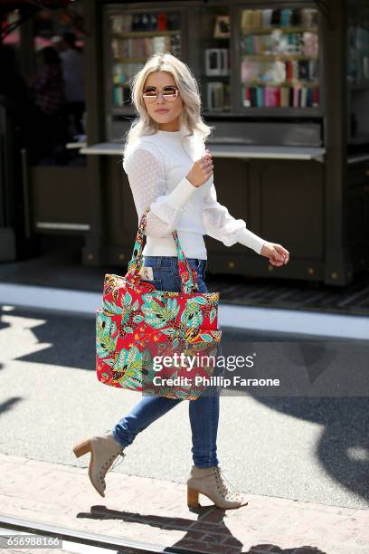 Witney Carson spotted leaving the dance studio carrying a Vera Bradley bag at The Grove on March 23, 2017 in Los Angeles, California.