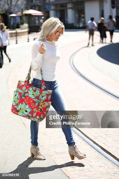 Witney Carson spotted leaving the dance studio carrying a Vera Bradley bag at The Grove on March 23, 2017 in Los Angeles, California.