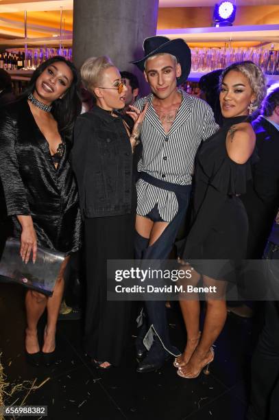 Kyle De'Volle poses with Alexandra Buggs, Courtney Rumbold and Karis Anderson of Stooshe at the launch of the JF London x Kyle De'Volle fall/winter...