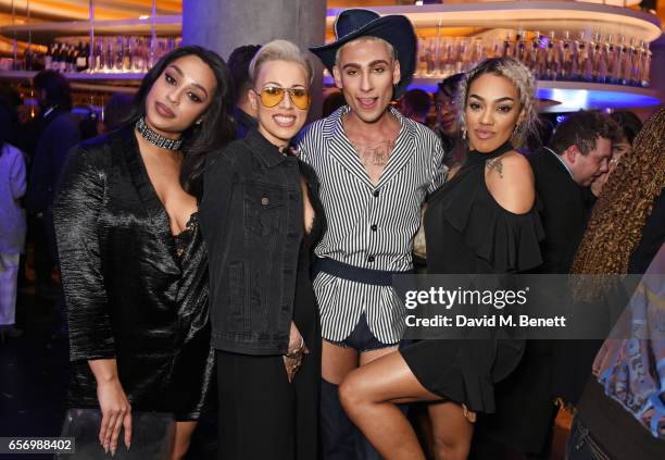 Kyle De'Volle poses with Alexandra Buggs, Courtney Rumbold and Karis Anderson of Stooshe at the launch of the JF London x Kyle De'Volle fall/winter...