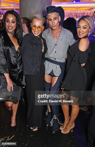 Kyle De'Volle poses with Alexandra Buggs, Courtney Rumbold and Karis Anderson of Stooshe at the launch of the JF London x Kyle De'Volle fall/winter...