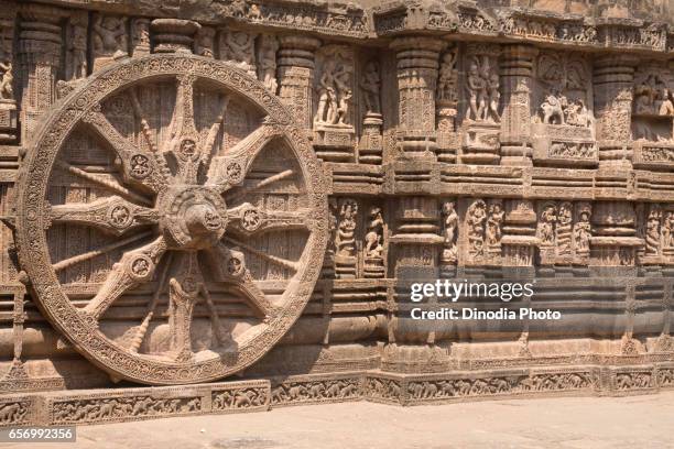 carving details of a wheel at konark sun temple, orissa, india - konark wheel stock pictures, royalty-free photos & images