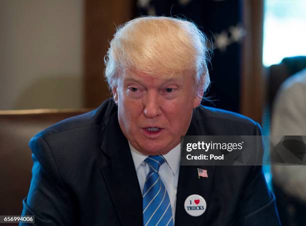 President Donald Trump holds a listening session on health care with truckers and CEOs from the American Trucking Associations in the Cabinet Room at...