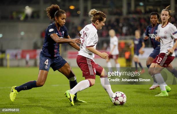 Nicole Rolser of Bayern fights for the ball with Laura Georges of Paris St. Germain during the UEFA women's champions league quarter finals at...
