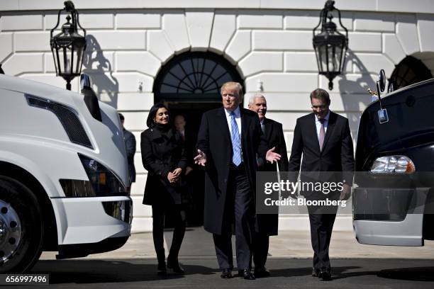 President Donald Trump, center, speaks while meeting Chris Spear, president of the American Trucking Associations , right, during an event to meet...