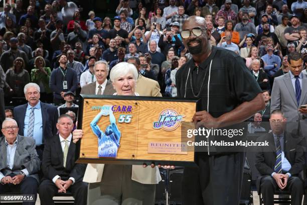 Former member of the Utah Jazz, Antoine Carr is honored during halftime of the New York Knicks game against the Utah Jazz at vivint.SmartHome Arena...