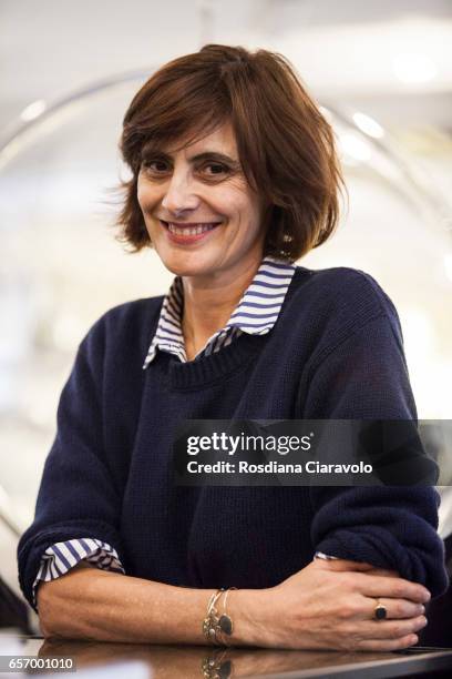 Author Ines De La Fressange poses at the presentaion of her book 'Parisian Chic Look Book: What Should I Wear Today?' at the Galleria Carla Sozzani...