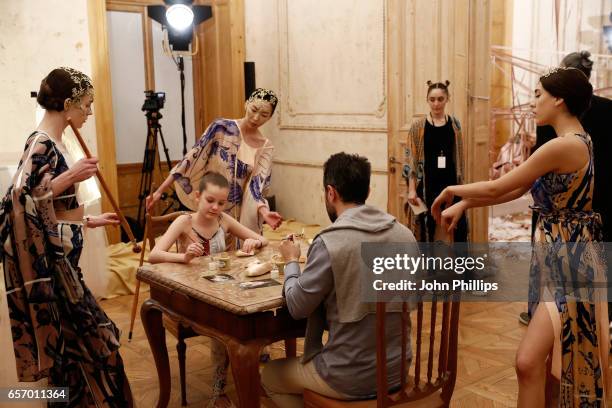 Models pose for a presentation at the Bashaques show during Mercedes-Benz Istanbul Fashion Week March 2017 at Grand Pera on March 23, 2017 in...