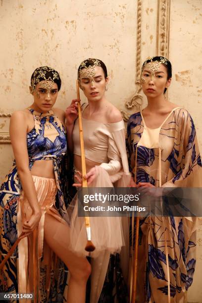 Models pose for a presentation at the Bashaques show during Mercedes-Benz Istanbul Fashion Week March 2017 at Grand Pera on March 23, 2017 in...