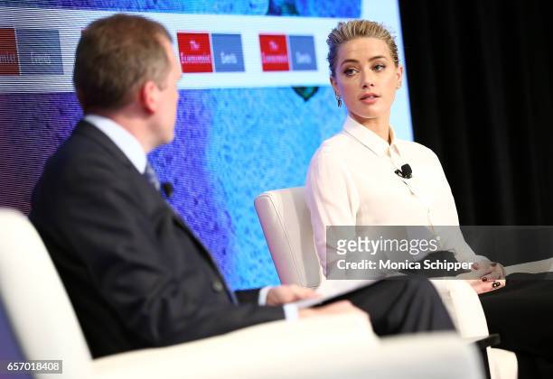 Deputy Editor of The Economist Tom Standage speaks with actress Amber Heard 1during the 2nd Annual Pride & Prejudice Summit at 10 on The Park on...