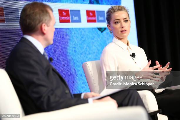 Deputy Editor of The Economist Tom Standage speaks with actress Amber Heard during the 2nd Annual Pride & Prejudice Summit at 10 on The Park on March...