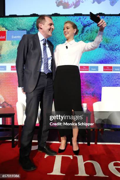 Deputy Editor of The Economist Tom Standage and actress Amber Heard take a selfie at the 2nd Annual Pride & Prejudice Summit at 10 on The Park on...