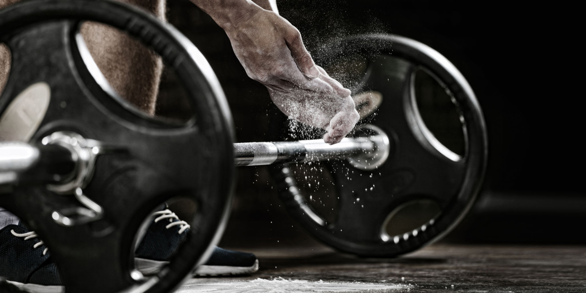 athlete using chalk