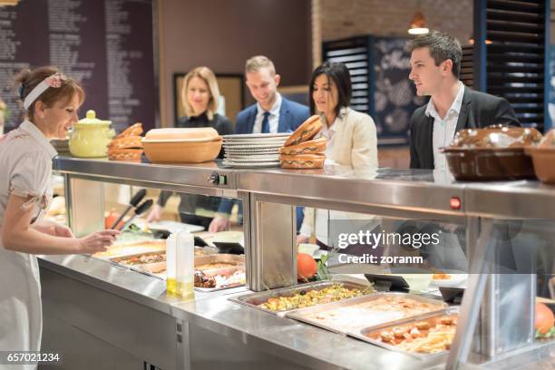 serving lunch in cafetreria - cantina imagens e fotografias de stock