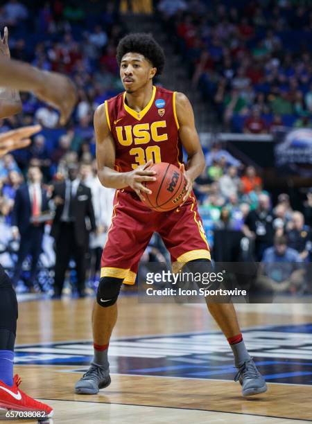 Trojans guard Elijah Stewart looks for an open teammate during the NCAA Tournament first round game game between the SMU Mustangs and the USC Trojans...
