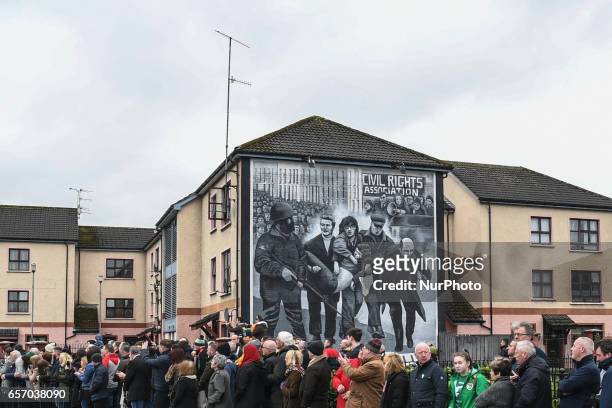 People await for the coffin of former Northern Ireland Deputy First Minister Martin McGuinness, in the Bogside neighbourhood of Derry. On Thursday,...