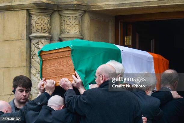 The coffin of former Northern Ireland Deputy First Minister Martin McGuinness arrives to St. Columba's Church Longtower for Requiem Mass, after a...