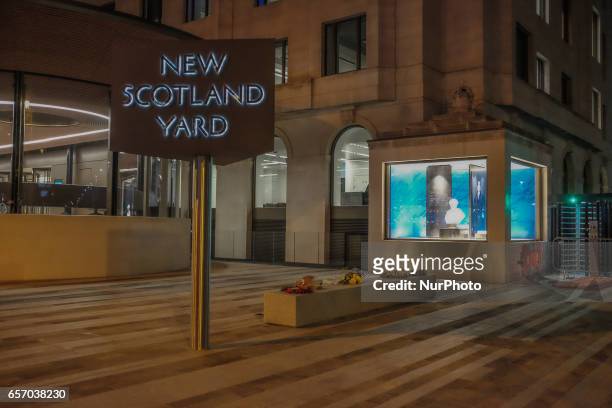 View of New Scotland Yard office in central London on March 23, 2017 in solidarity with the victims of the March 22 terror attack at the British...