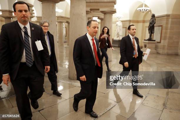 White House Chief Strategist Steve Bannon and White House Chief of Staff Reince Priebus leave a meeting of the House Republican caucus at the U.S....
