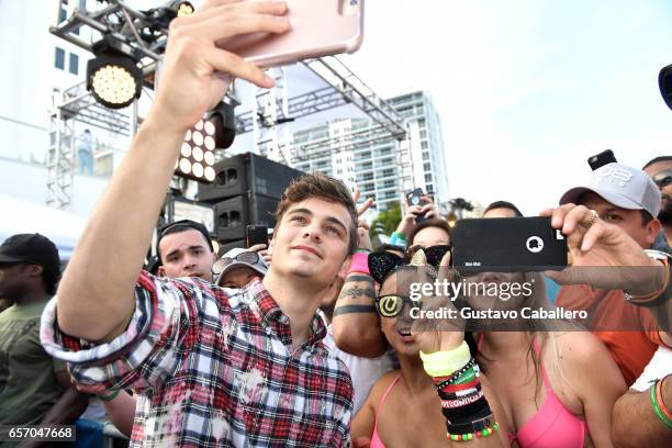 Martin Garrix takes a selfie with fans at the SiriusXM Music Lounge at 1 Hotel South Beach on March 23, 2017 in Miami, Florida.