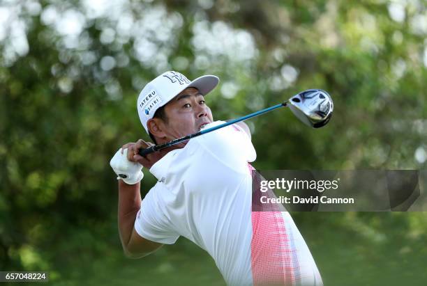 Hideto Tanihara of Japan plays his tee shot on the par 5, 12th hole in his match against Ryan Moore during the second round of the 2017 Dell Match...