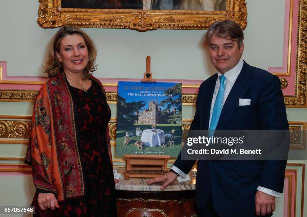 Lady Carnarvron and Lord Carnarvron attend the launch of new book "At Home At Highclere: Entertaining At The Real Downton Abbey" By The Countess Of...
