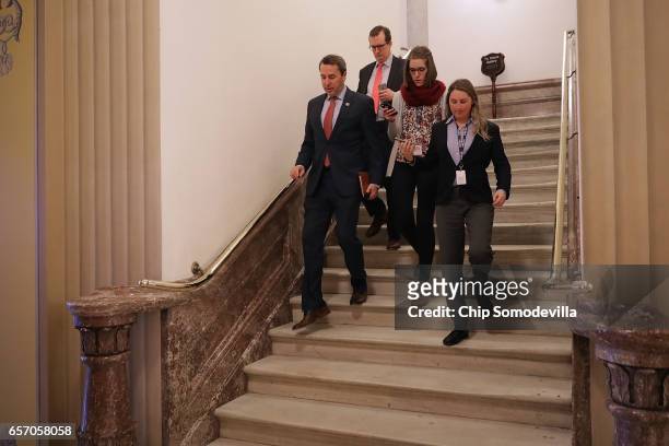Chairman of the Republican Study Committee Rep. Mark Walker talks to reporters as he moves throught the U.S. Capitol March 23, 2017 in Washington,...