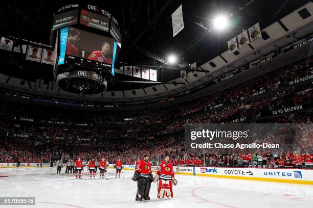 Former Chicago Blackhawks goaltender Ed Belfour stands with Corey Crawford of the Chicago Blackhawks during their "One More Shift" campaign prior to...