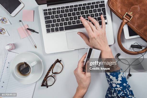 overhead business angles woman at office desk - reading glasses top view stock pictures, royalty-free photos & images