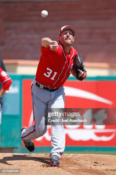 Max Scherzer of the Washington Nationals warms up in the bullpen prior to starting the spring training game against the St Louis Cardinals at Roger...