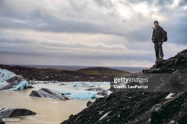 man exploring the wild area and remote places in iceland - arctic explorer stock pictures, royalty-free photos & images