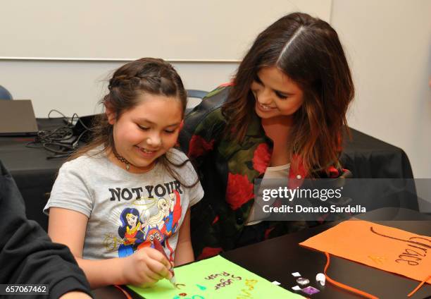 Selena Gomez and Coach Surprise Step Up Teens at High Schools on March 23, 2017 in Los Angeles, California.