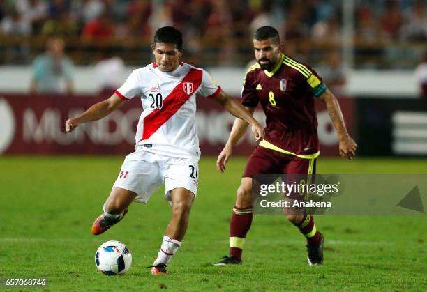 Edinson Flores of Peru fights for the ball with Tomas Rincon of Venezuela during a match between Venezuela and Peru as part of FIFA 2018 World Cup...