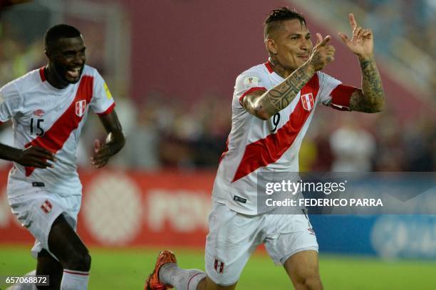 Peru's forward Paolo Guerrero celebrates a goal he scored against Venezuela during their 2018 FIFA World Cup qualifier football match in Maturin,...