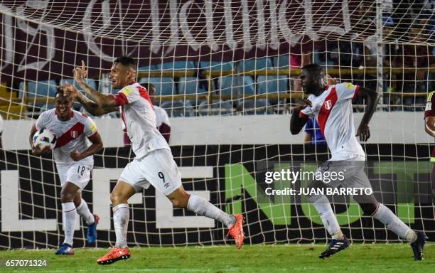 Peru's forward Paolo Guerrero celebrates after scoring against Venezuela during their 2018 FIFA World Cup qualifier football match in Maturin,...