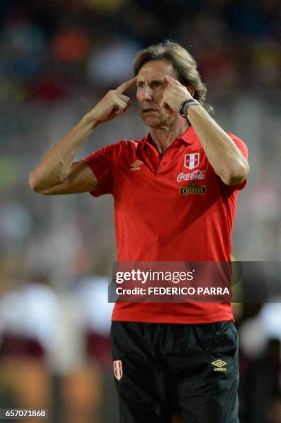 Peru's coach Ricardo Gareca gestures during the 2018 FIFA World Cup qualifier football match against Venezuela in Maturin, Venezuela, on March 23,...
