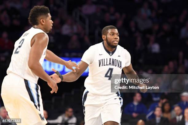 Eric Paschall of the Villanova Wildcats celebrates a shot with Kris Jenkins during the Big East Basketball Tournament - Quarterfinal game against the...