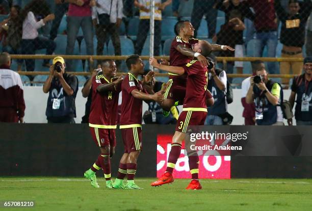Mikel Villanueva of Venezual celebrates with teammates after scoring the opening goal during a match between Venezuela and Peru as part of FIFA 2018...