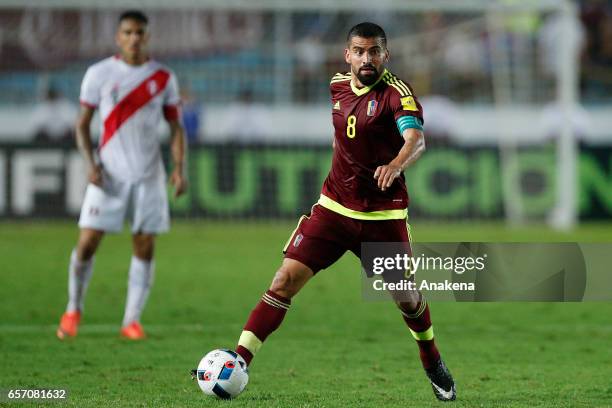 Tomas Rincon of Venezuela drives the ball during a match between Venezuela and Peru as part of FIFA 2018 World Cup Qualifiers at Monumental de...