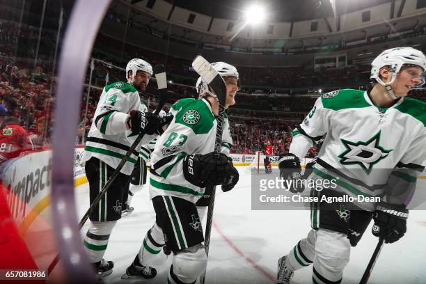 Ales Hemsky of the Dallas Stars reacts in between Jamie Benn and John Klingberg after scoring and tying the game in the third period against the...