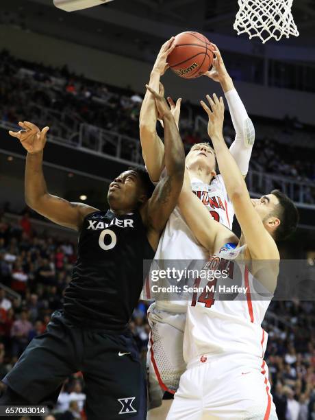 Lauri Markkanen of the Arizona Wildcats rebounds against Tyrique Jones of the Xavier Musketeers in the first half during the 2017 NCAA Men's...