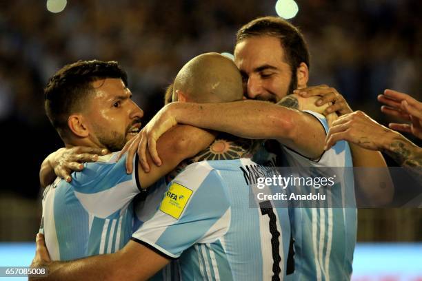 Lionel Messi, Sergio Aguero, Javier Mascherano and Gonzalo Higuain of Argentina celebrate scoring a goal during the FIFA 2018 World Cup Qualifiers...