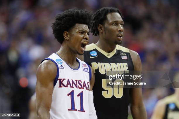 Josh Jackson of the Kansas Jayhawks reacts in the second half as Caleb Swanigan of the Purdue Boilermakers looks on during the 2017 NCAA Men's...